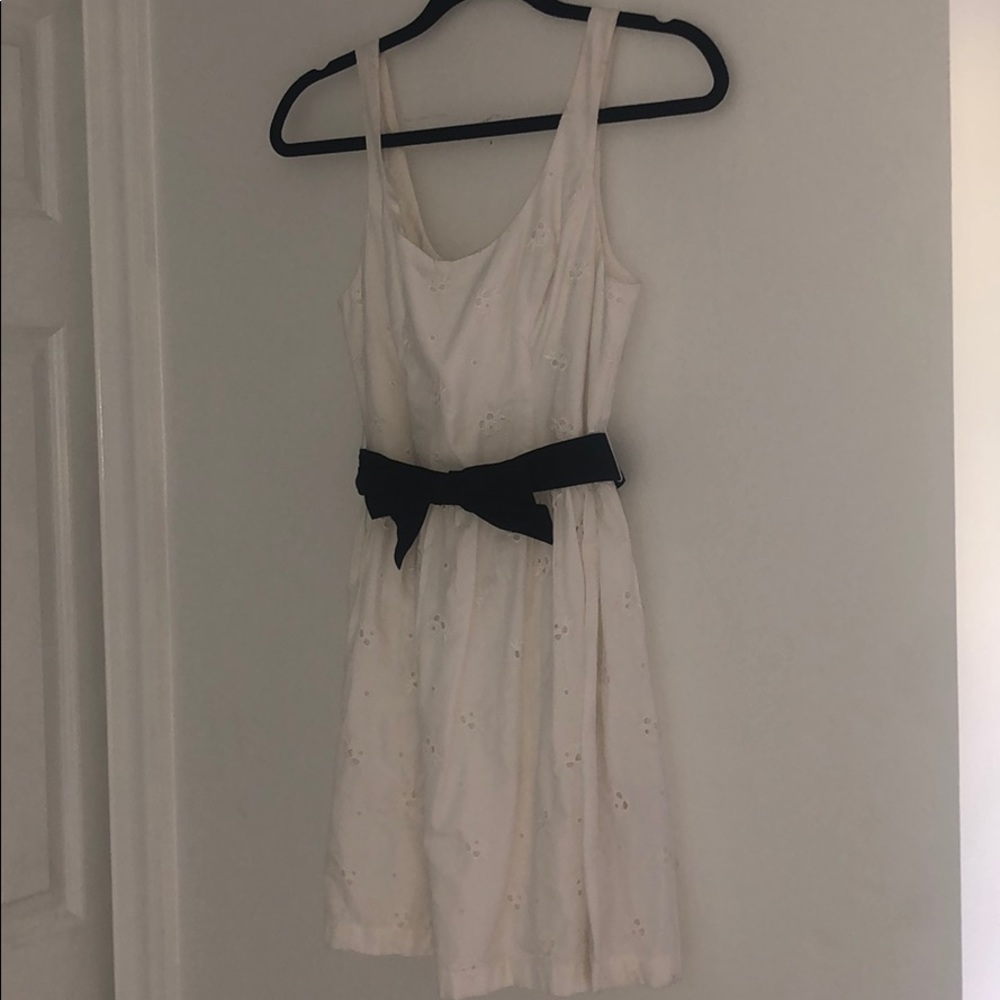 White mini dress with navy bow